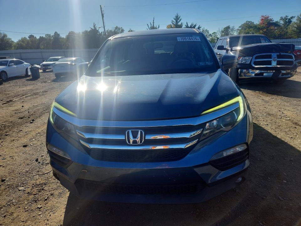 Photo 5 from auction – 2016 HONDA PILOT with VIN 5FNYF6H57GB105957