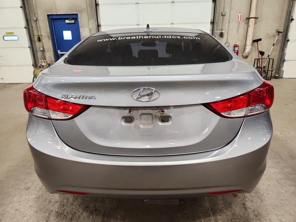 Снимка 5 от търг – 2013 HYUNDAI ELANTRA с VIN KMHDH4AE7DU912534
