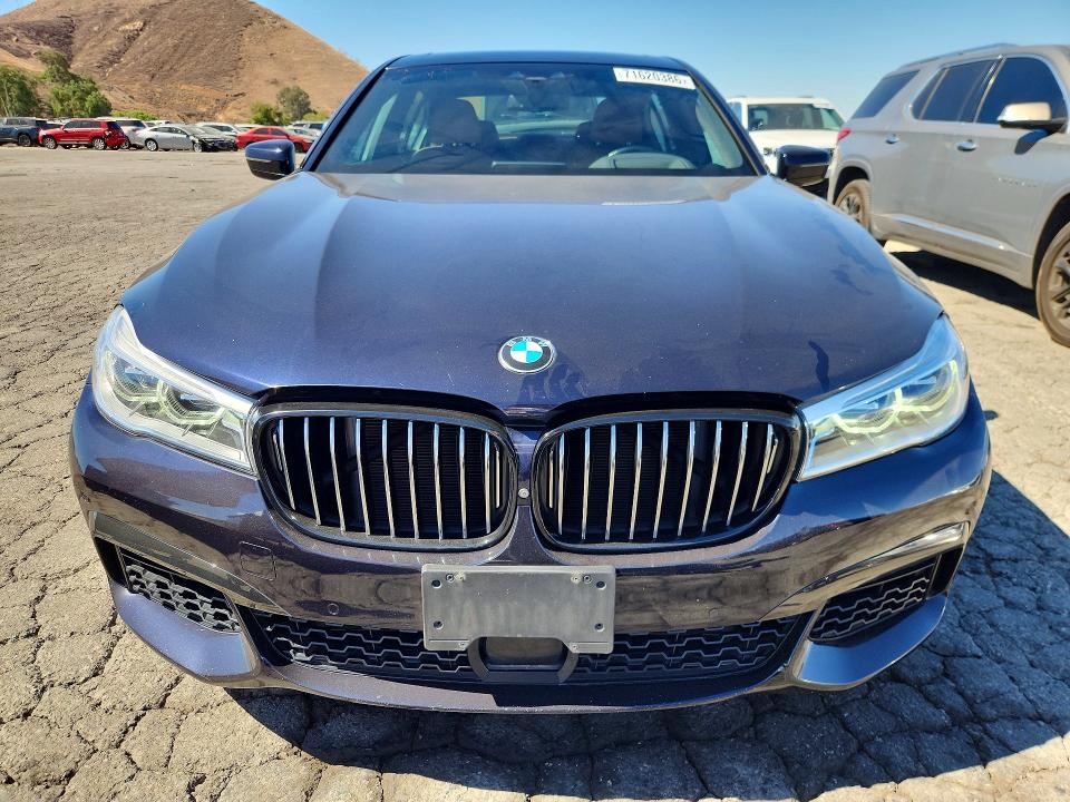 Фото 5 с аукциона – 2019 BMW 750 с VIN WBA7F0C51KGM24900