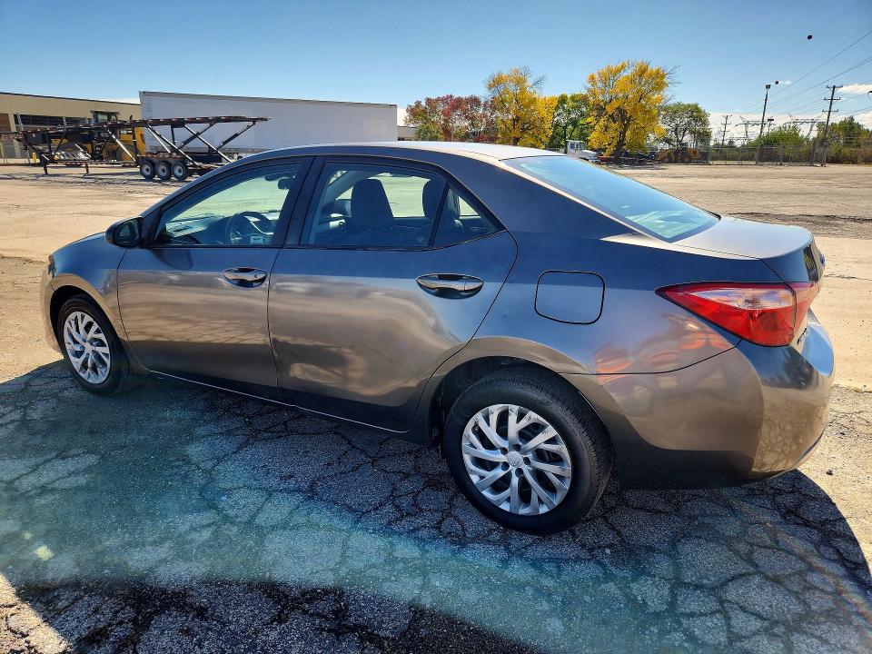 Photo 2 from auction – 2018 TOYOTA COROLLA with VIN 5YFBURHE9JP744575