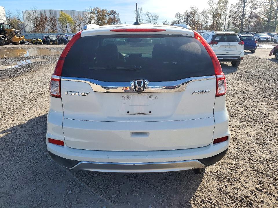 Photo 6 from auction – 2016 HONDA CR-V with VIN 5J6RM4H71GL135639