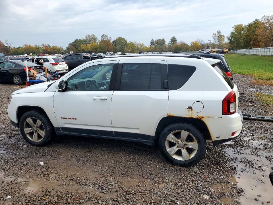 Photo 2 from auction – 2014 JEEP COMPASS with VIN 1C4NJDAB6ED840908