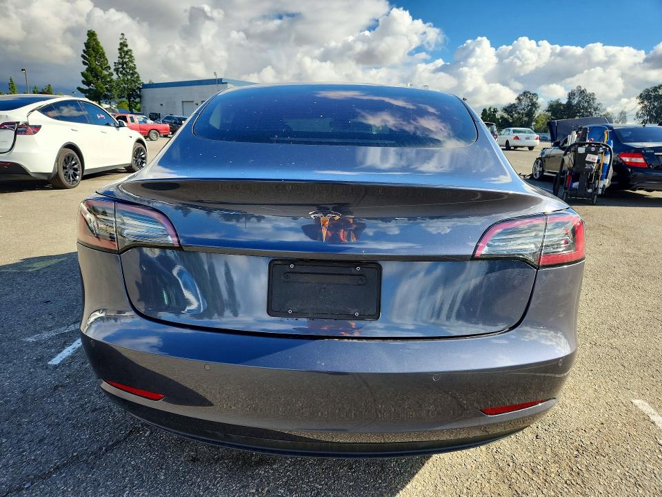 Снимка 6 от търг – 2022 TESLA MODEL 3 с VIN 5YJ3E1EA7NF296231