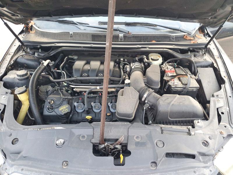 Photo 11 from auction – 2013 FORD TAURUS with VIN 1FAHP2H81DG230203