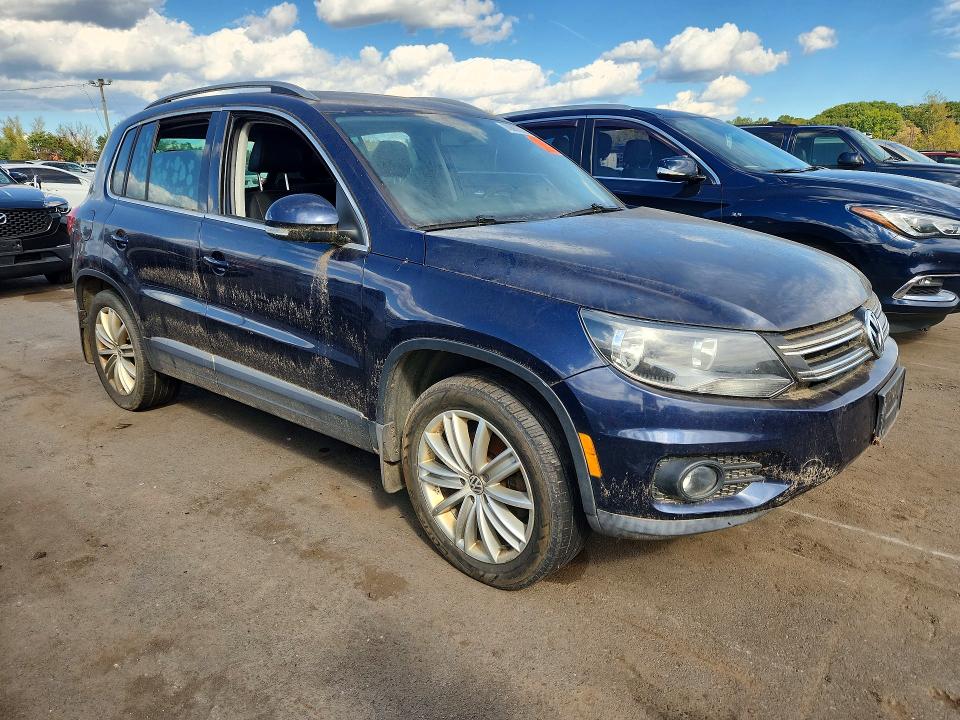 Снимка 4 от търг – 2013 VOLKSWAGEN TIGUAN с VIN WVGBV3AXXDW599043