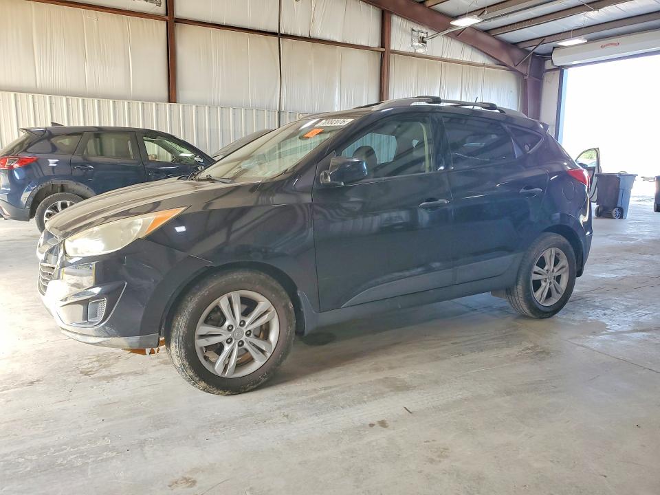 HYUNDAI TUCSON 2011 с VIN KM8JUCAC7BU200352 - Снимка от търг