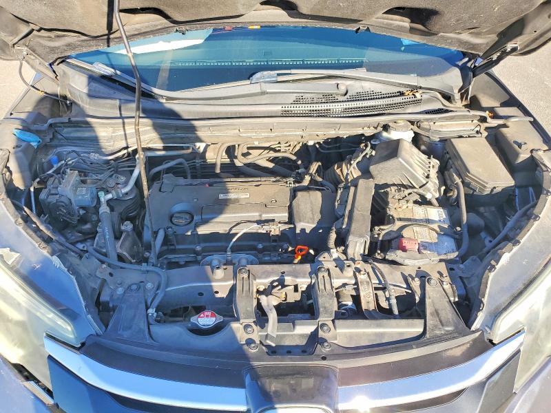 Photo 12 from auction – 2016 HONDA CR-V with VIN 5J6RM4H99GL013340
