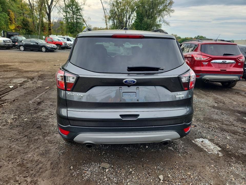 Photo 6 from auction – 2018 FORD ESCAPE with VIN 1FMCU0G94JUB62564