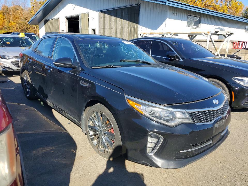 Photo 4 from auction – 2018 KIA OPTIMA with VIN 5XXGV4L29JG245612
