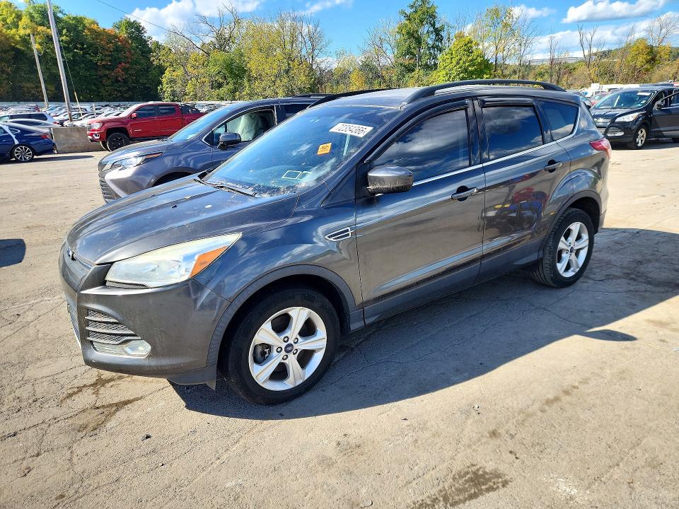 FORD ESCAPE 2015 with VIN 1FMCU9GXXFUC56944 - Photo from auction