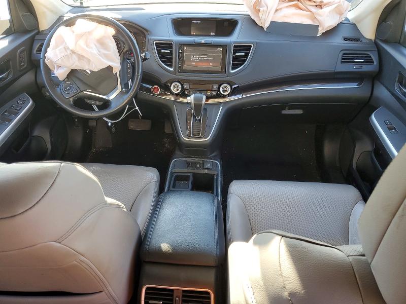 Photo 8 from auction – 2016 HONDA CR-V with VIN 5J6RM4H99GL013340