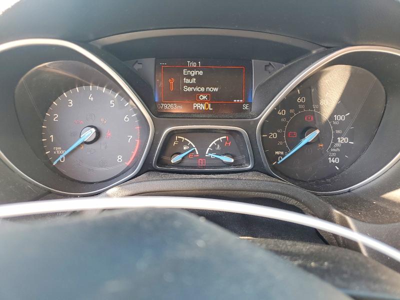 Foto 9 de la subasta – 2015 FORD FOCUS con VIN 1FADP3K29FL352424