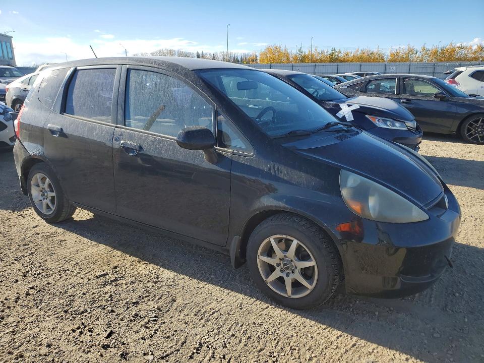 Снимка 4 от търг – 2007 HONDA FIT с VIN JHMGD38417S805773