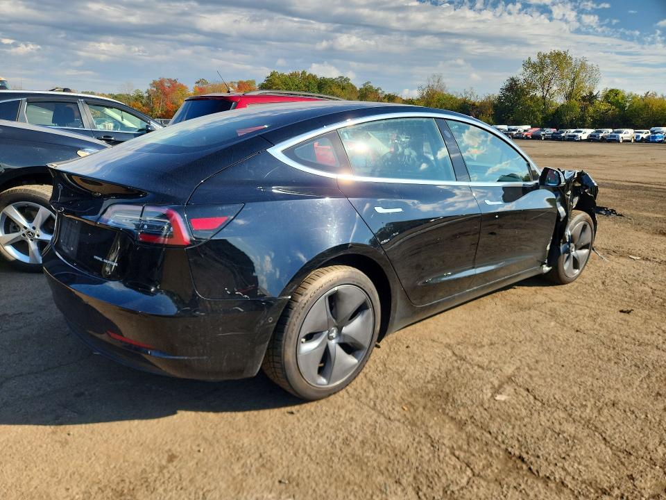 Снимка 3 от търг – 2018 TESLA MODEL 3 с VIN 5YJ3E1EB6JF068160