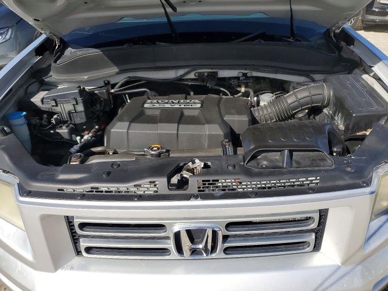 Снимка 11 от търг – 2007 HONDA RIDGELINE с VIN 2HJYK16277H535050