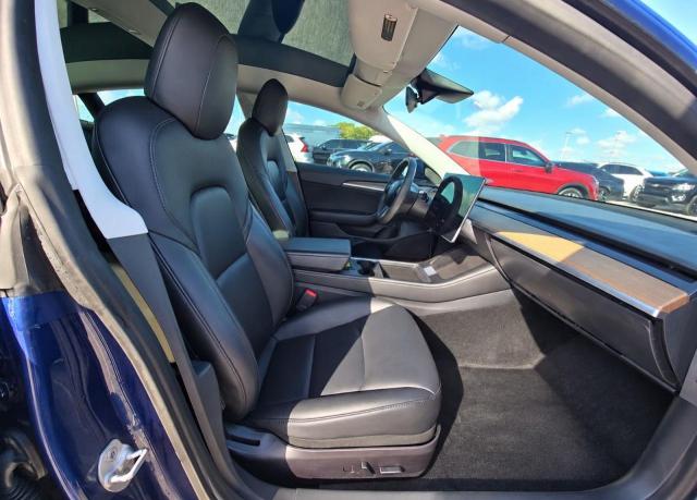 Снимка 5 от търг – 2021 TESLA MODEL 3 с VIN 5YJ3E1EA9MF090469