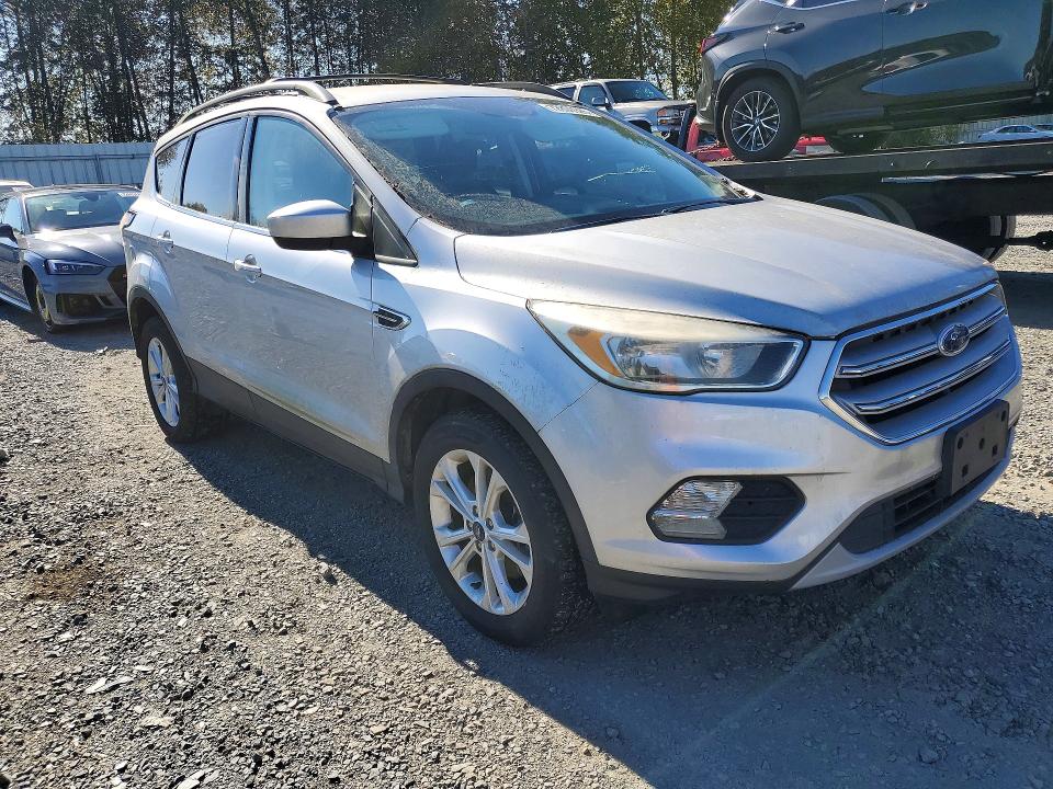 Снимка 4 от търг – 2018 FORD ESCAPE с VIN 1FMCU9GD0JUC35048