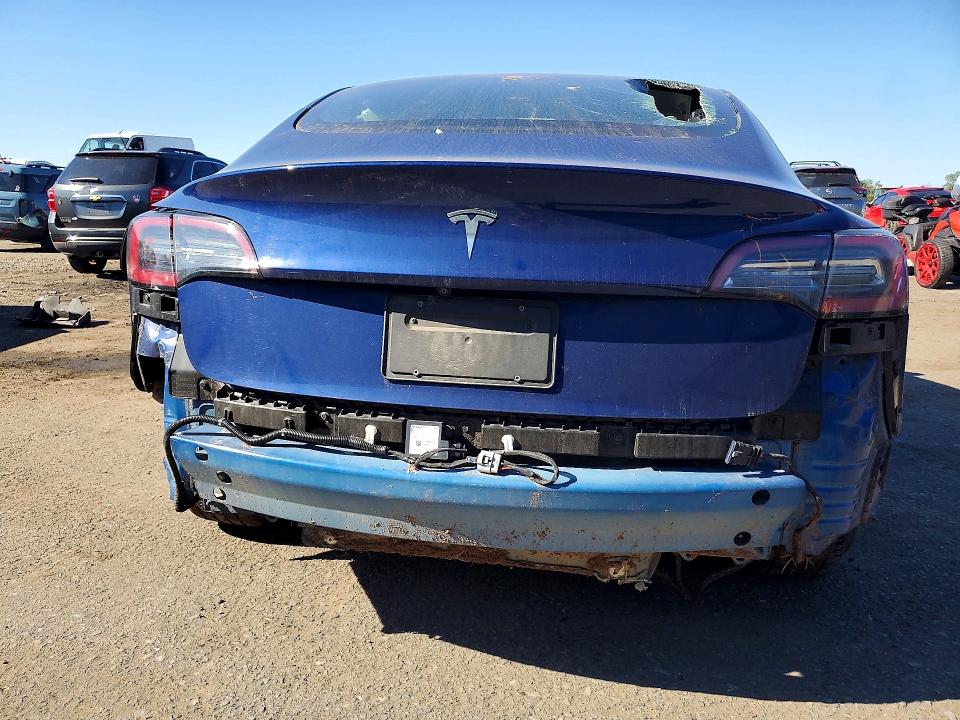 Снимка 6 от търг – 2023 TESLA MODEL 3 с VIN 5YJ3E1EA1PF434204