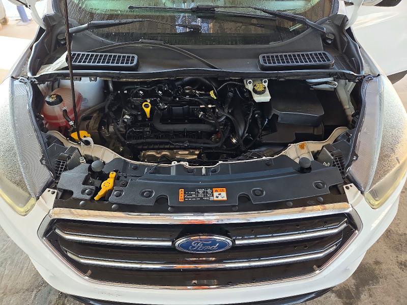 Photo 12 from auction – 2019 FORD ESCAPE with VIN 1FMCU9GDXKUA58851