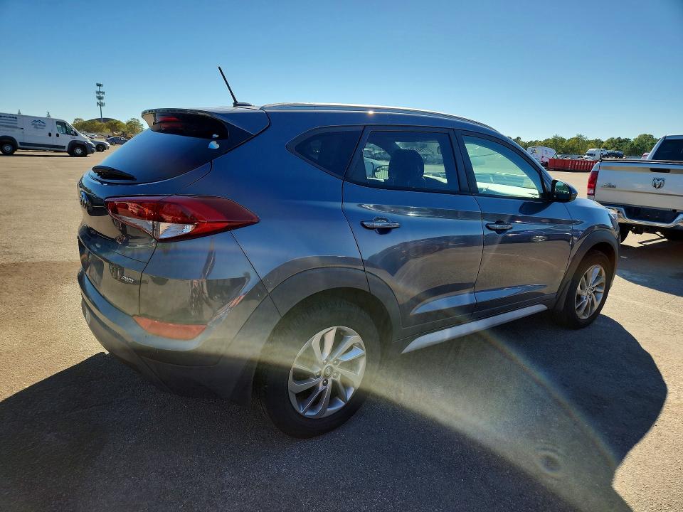 Photo 3 from auction – 2017 HYUNDAI TUCSON with VIN KM8J3CA4XHU509348