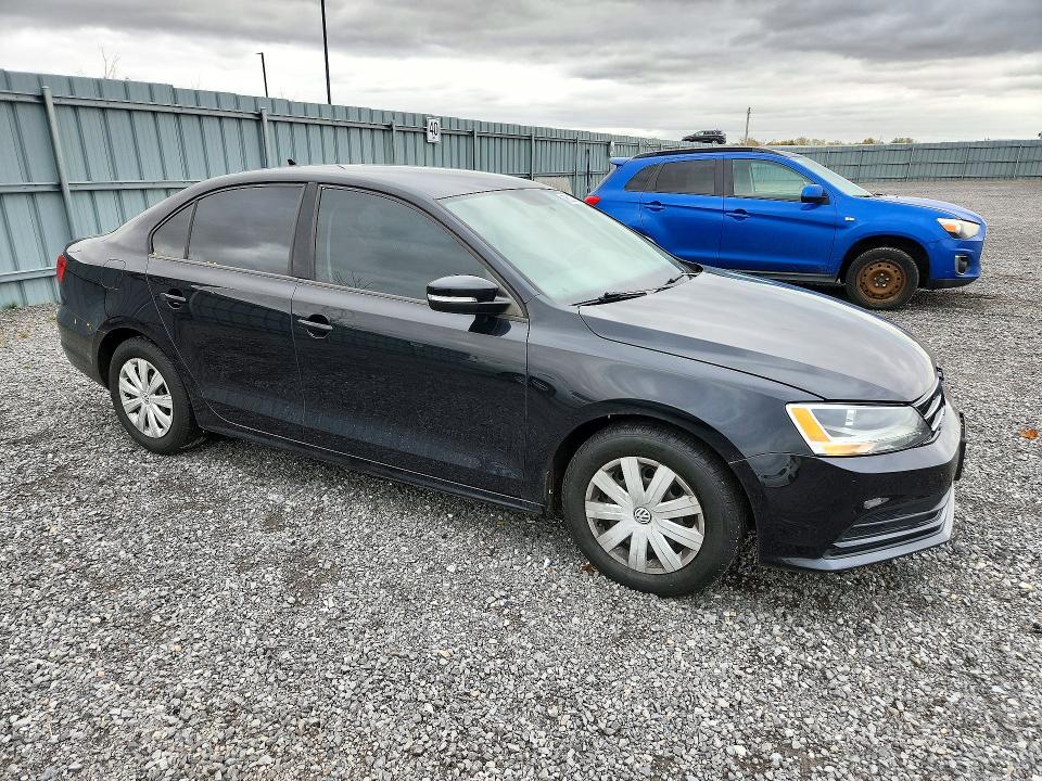 Photo 4 from auction – 2015 VOLKSWAGEN JETTA with VIN 3VW2K7AJ0FM323714