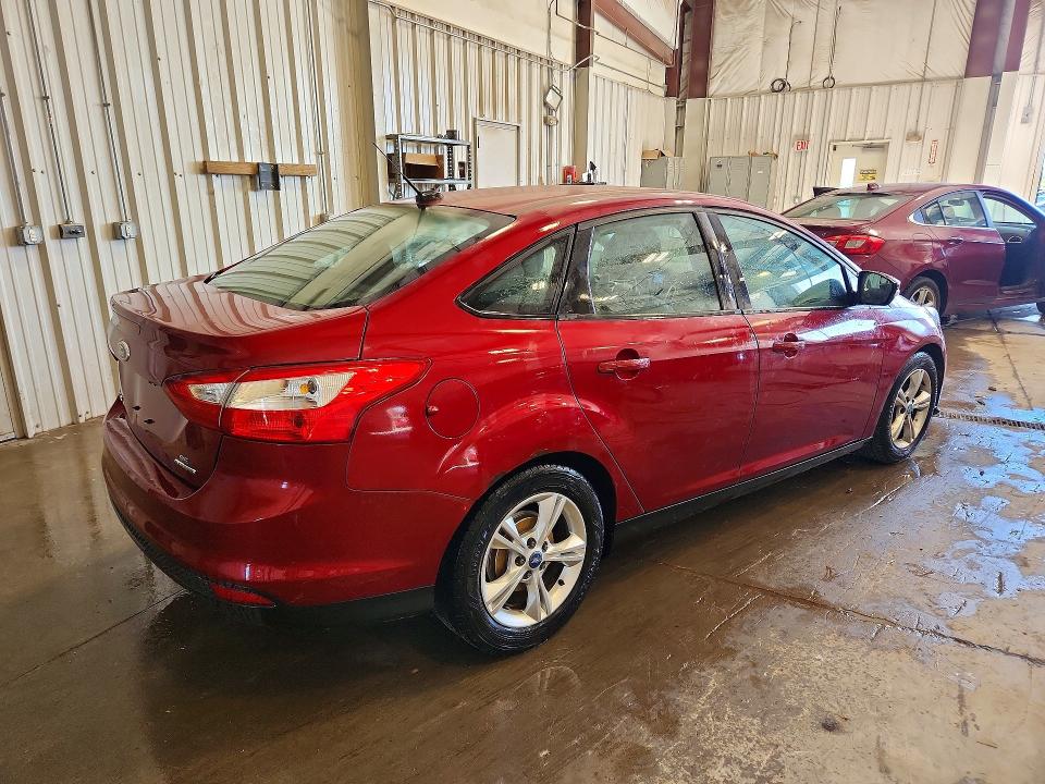 Photo 3 from auction – 2014 FORD FOCUS with VIN 1FADP3F24EL413588