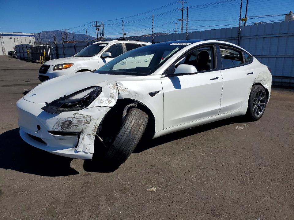 TESLA MODEL 3 2022 с VIN 5YJ3E1EA3NF163515 - Снимка от търг