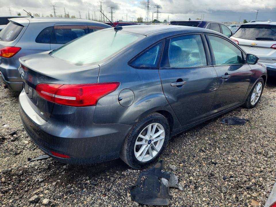 Снимка 3 от търг – 2017 FORD FOCUS с VIN 1FADP3F22HL280334
