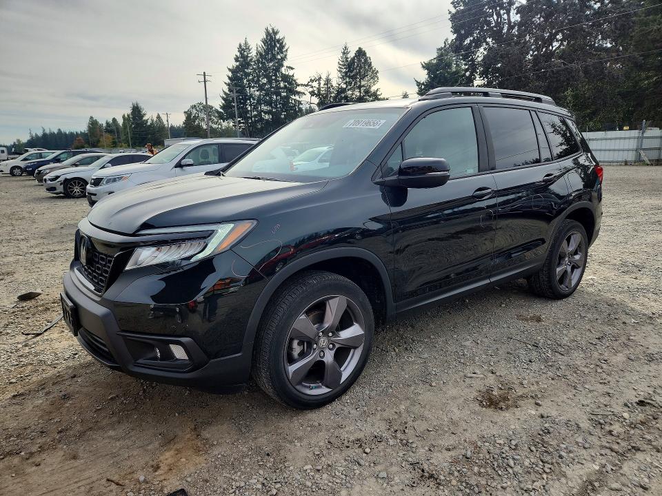 HONDA PASSPORT 2020 with VIN 5FNYF8H90LB011573 - Photo from auction