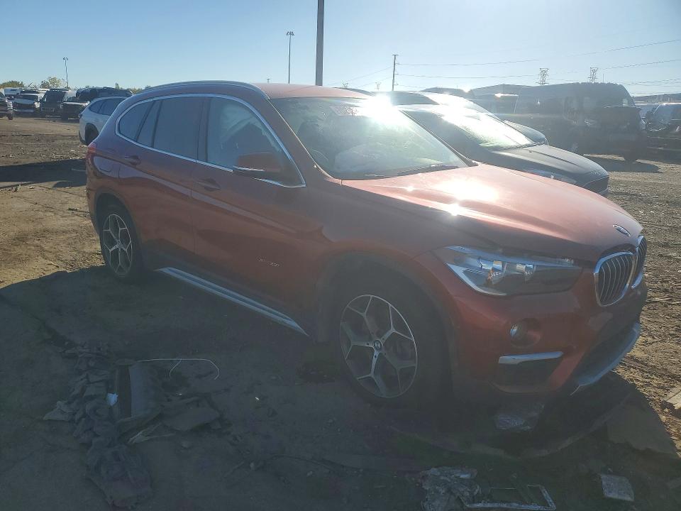 Foto 4 de la subasta – 2018 BMW X1 con VIN WBXHT3C32J5K28977