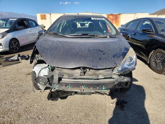 Снимка 5 от търг – 2015 TOYOTA PRIUS C с VIN JTDKDTB32F1100335