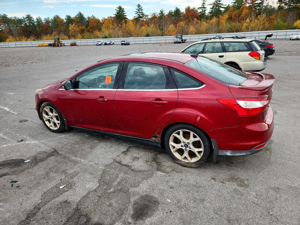 Снимка 2 от търг – 2014 FORD FOCUS с VIN 1FADP3J24EL215133