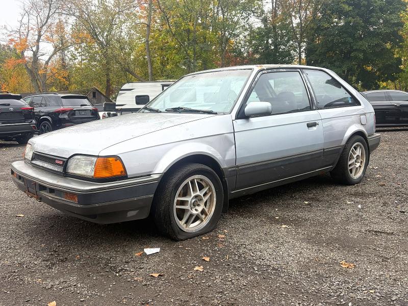 MAZDA 323 1988 مع رقم تعريف المركبة JM1BF2346J0144896 - صورة من المزاد