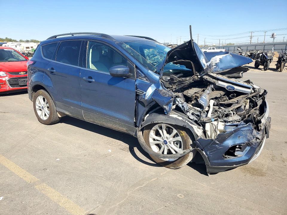 Photo 4 from auction – 2018 FORD ESCAPE with VIN 1FMCU9HD2JUC36197