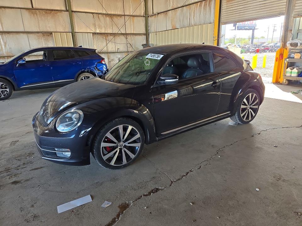 VOLKSWAGEN BEETLE 2012 with VIN 3VWVA7AT9CM642686 - Photo from auction
