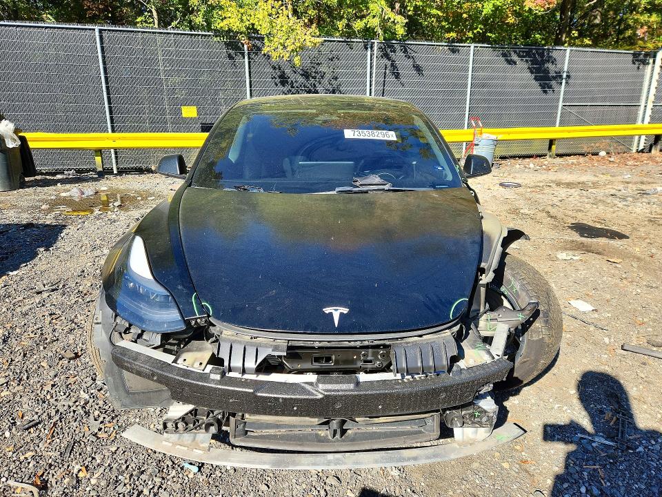Снимка 5 от търг – 2022 TESLA MODEL 3 с VIN 5YJ3E1EA4NF341853