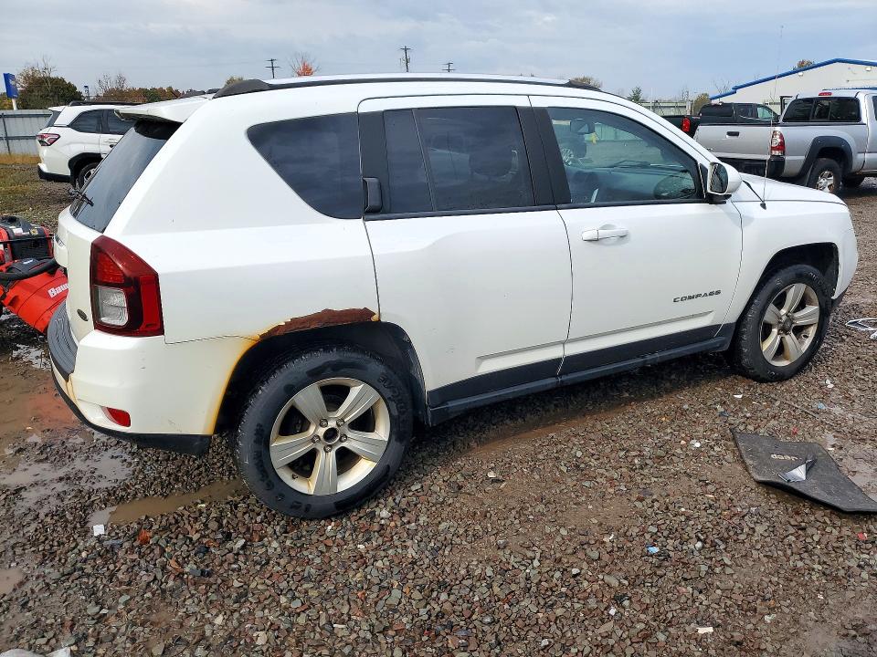 Photo 3 from auction – 2014 JEEP COMPASS with VIN 1C4NJDAB6ED840908
