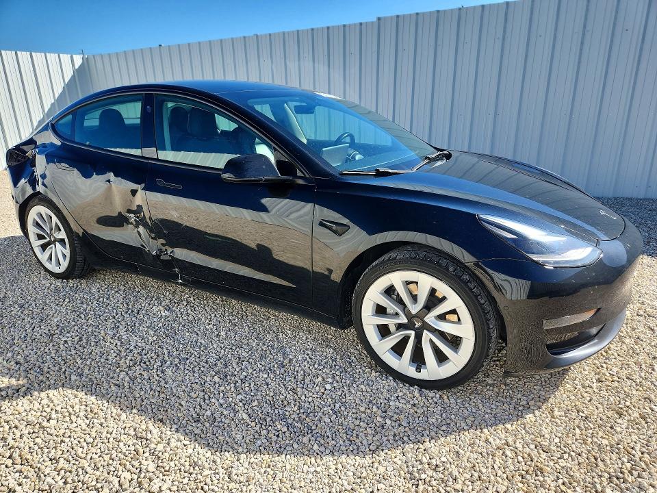 Снимка 4 от търг – 2022 TESLA MODEL 3 с VIN 5YJ3E1EAXNF372413
