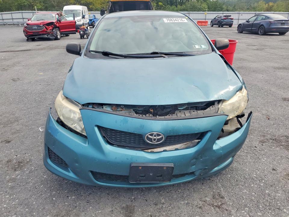 Снимка 5 от търг – 2009 TOYOTA COROLLA с VIN JTDBL40E999034689