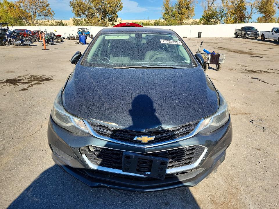 Снимка 5 от търг – 2018 CHEVROLET CRUZE с VIN 1G1BE5SM9J7233349
