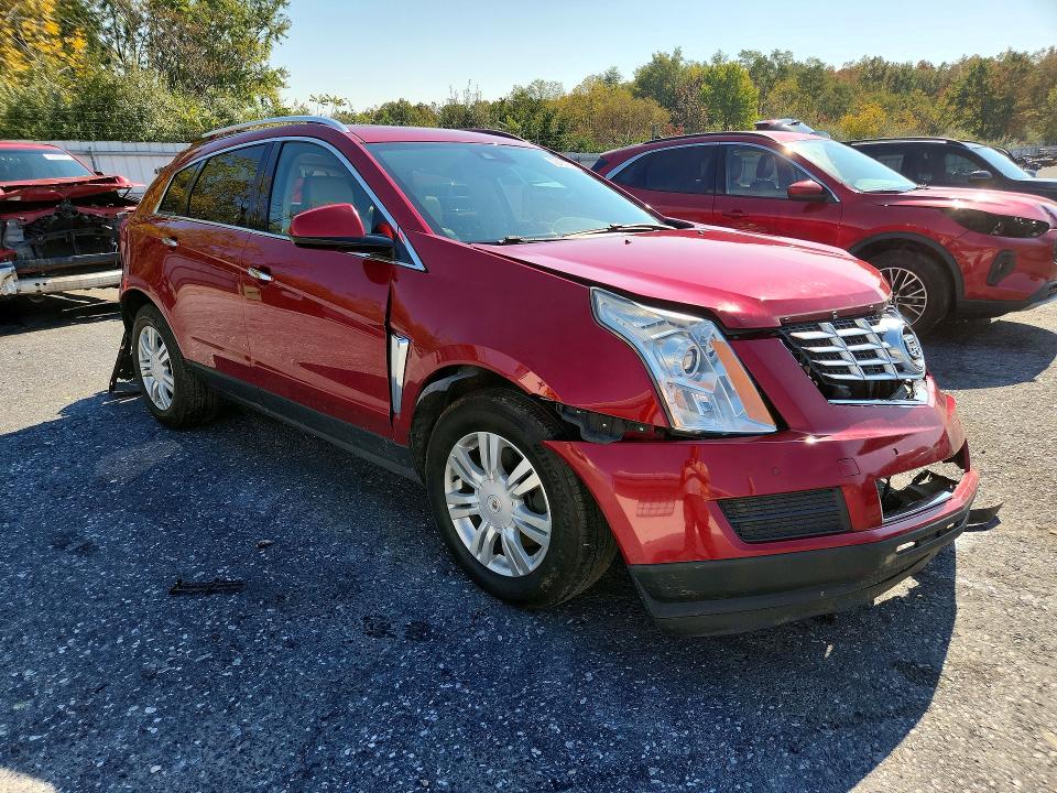 Снимка 4 от търг – 2015 CADILLAC SRX с VIN 3GYFNEE37FS555552