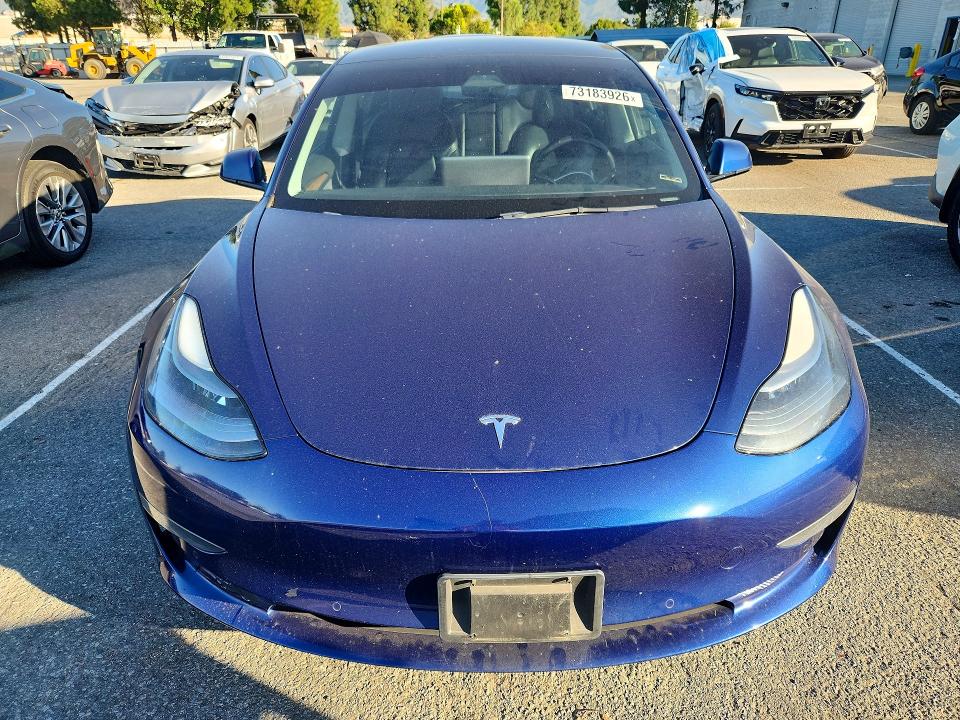 Photo 5 from auction – 2022 TESLA MODEL 3 with VIN 5YJ3E1EB4NF142567