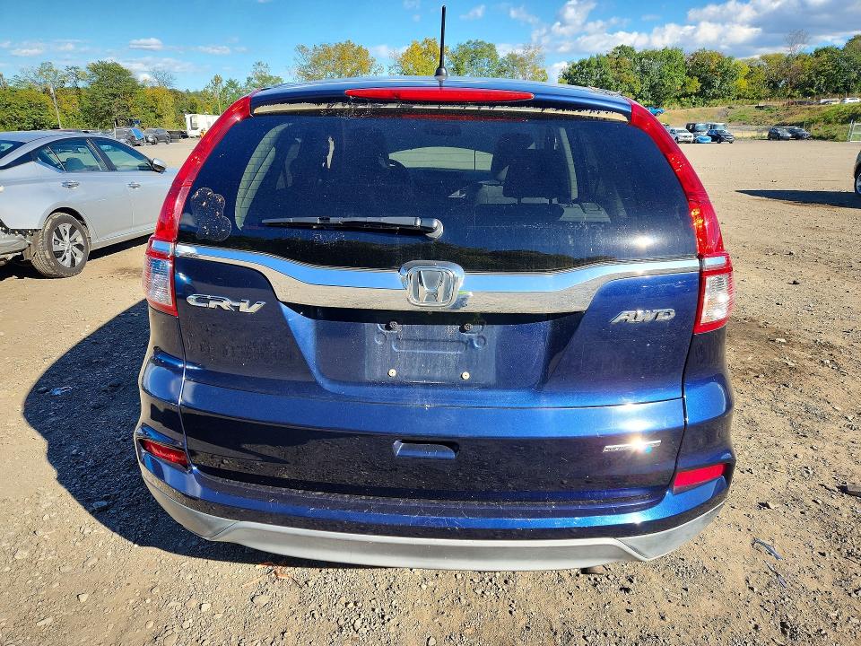 Photo 6 from auction – 2016 HONDA CR-V with VIN 5J6RM4H41GL037989