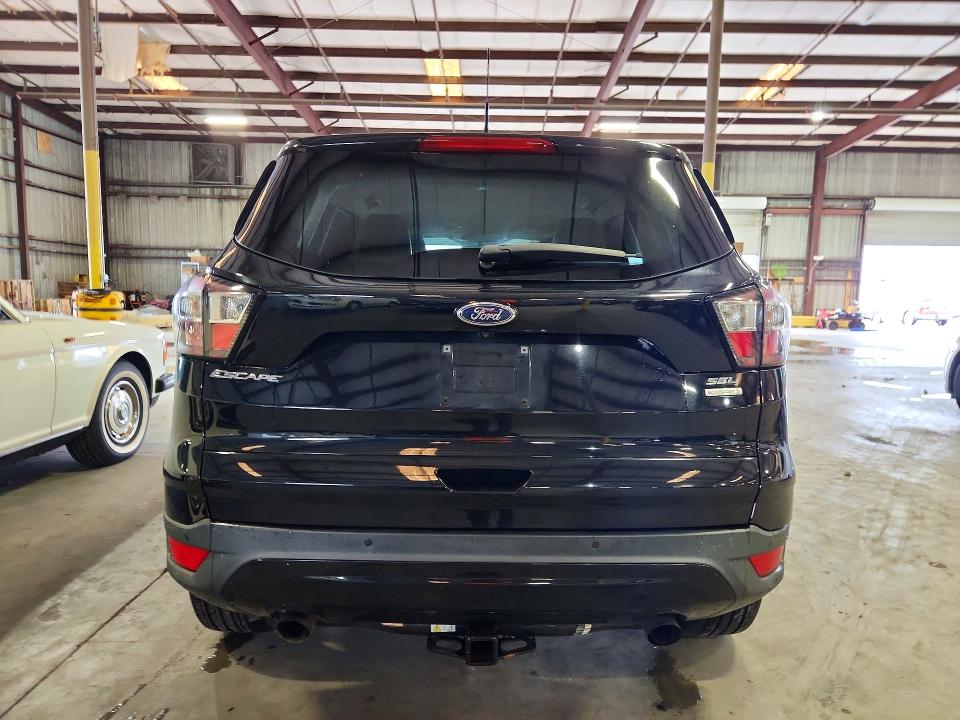 Снимка 6 от търг – 2018 FORD ESCAPE с VIN 1FMCU0HD7JUD00701