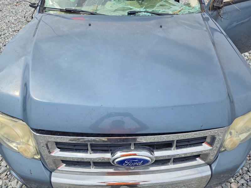 Снимка 12 от търг – 2011 FORD ESCAPE с VIN 1FMCU0EG7BKC60292