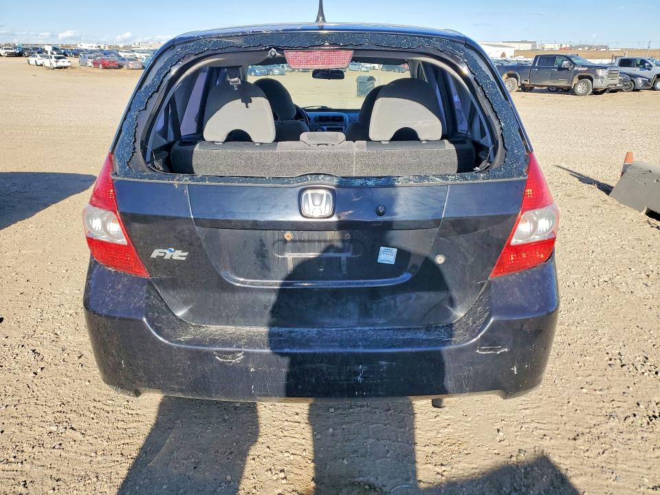 Снимка 6 от търг – 2007 HONDA FIT с VIN JHMGD38417S805773