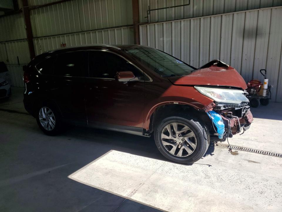 Photo 4 from auction – 2015 HONDA CR-V with VIN 2HKRM3H71FH510609