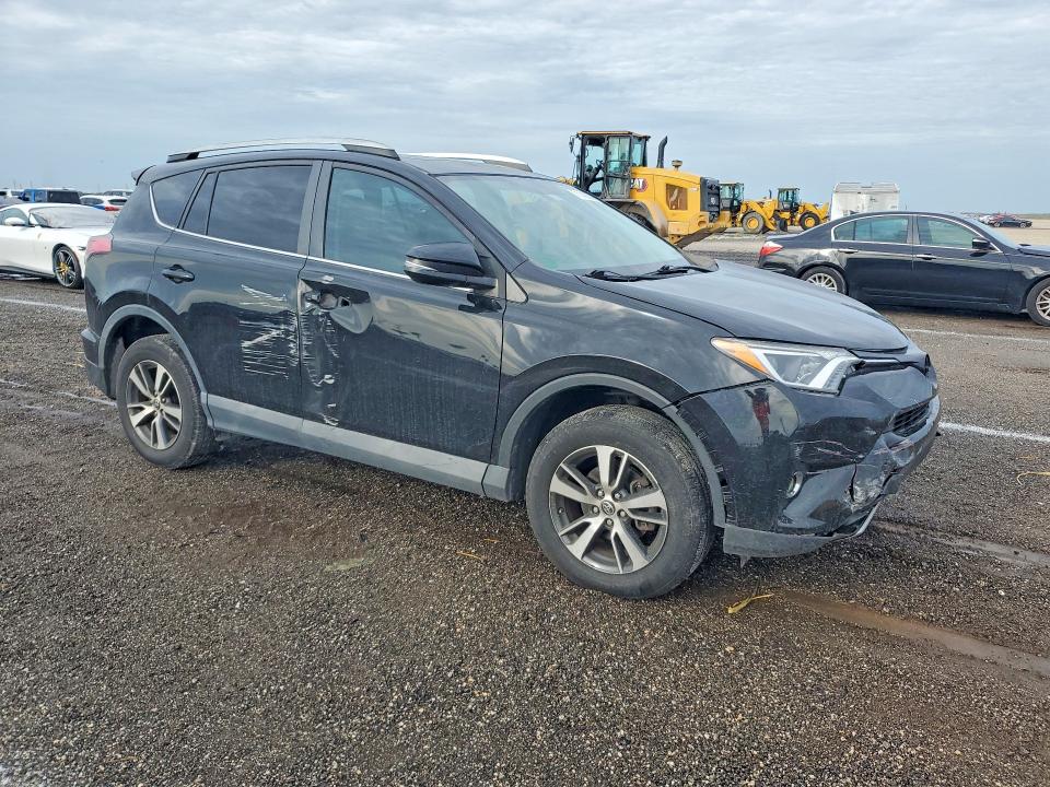 Photo 4 from auction – 2016 TOYOTA RAV4 with VIN 2T3WFREV7GW268311