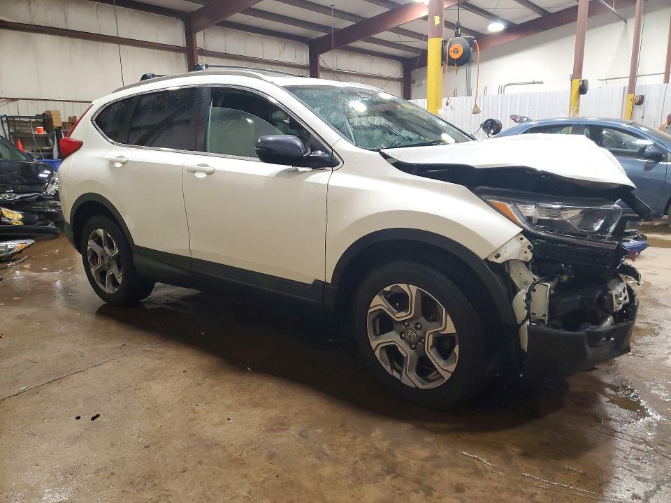 Photo 4 from auction – 2018 HONDA CR-V with VIN 2HKRW2H82JH687739