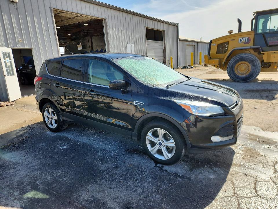 Photo 4 from auction – 2014 FORD ESCAPE with VIN 1FMCU9GX9EUC03053